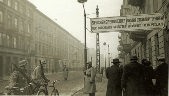 "In March 1940, the Jewish quarter of Warsaw gain a new description; “Quarantine: Typhus-Endangered Area